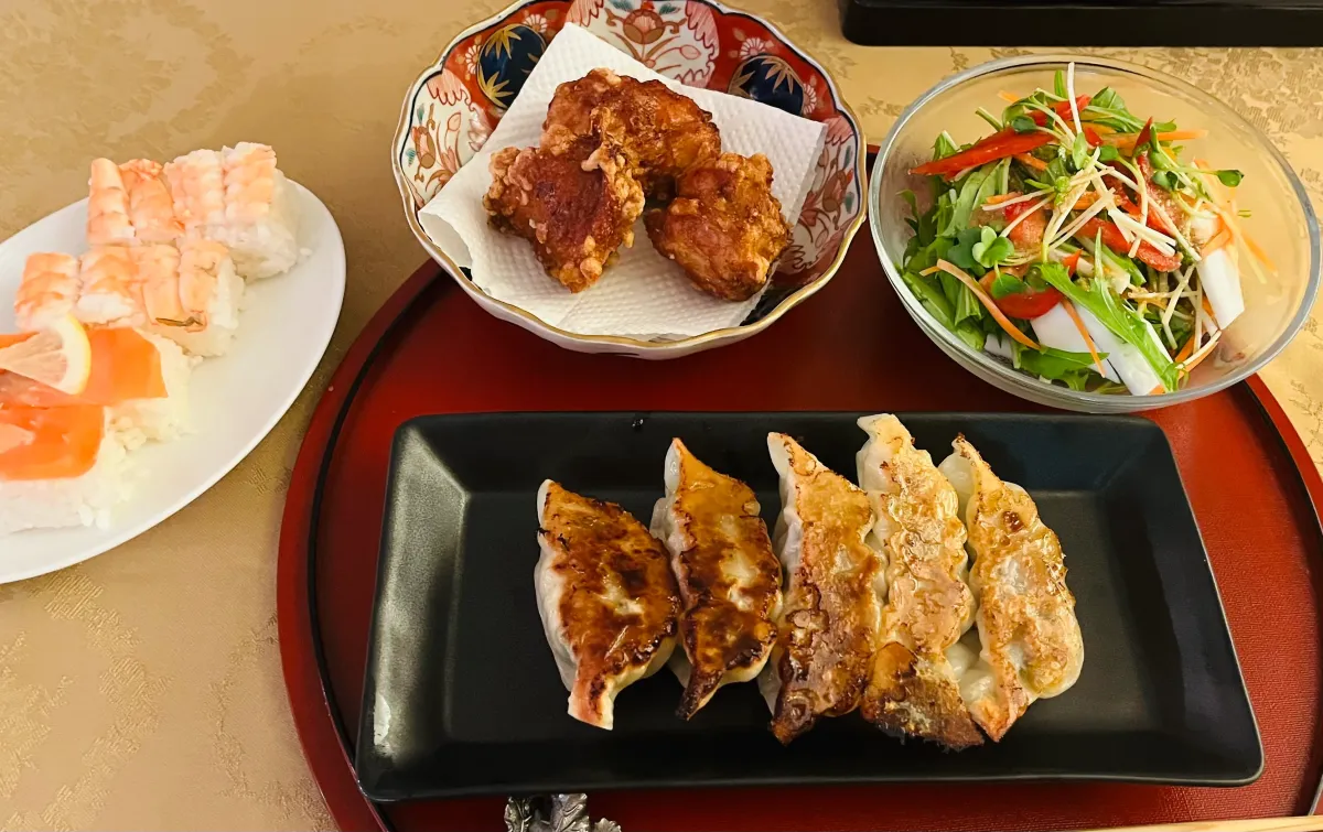 Gyoza and Karaage Course: pan-fried gyoza, karaage, fresh salad and pressed sushi